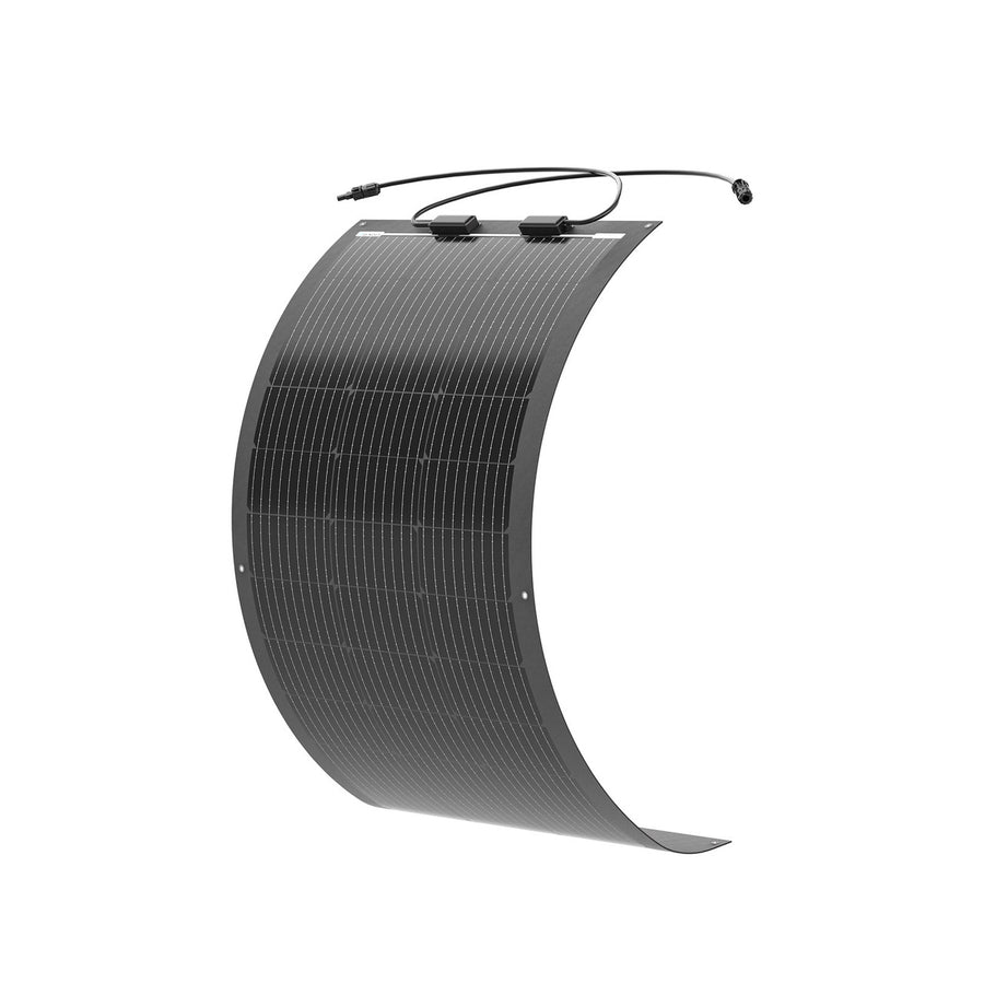Renogy 100W Black Division Lightweight Monocrystalline solar panel, all-black flexible laminate photographed curved to show its bendability, with two black MC4 junction boxes at the top edge and small brass tie-down grommets down each long edge.